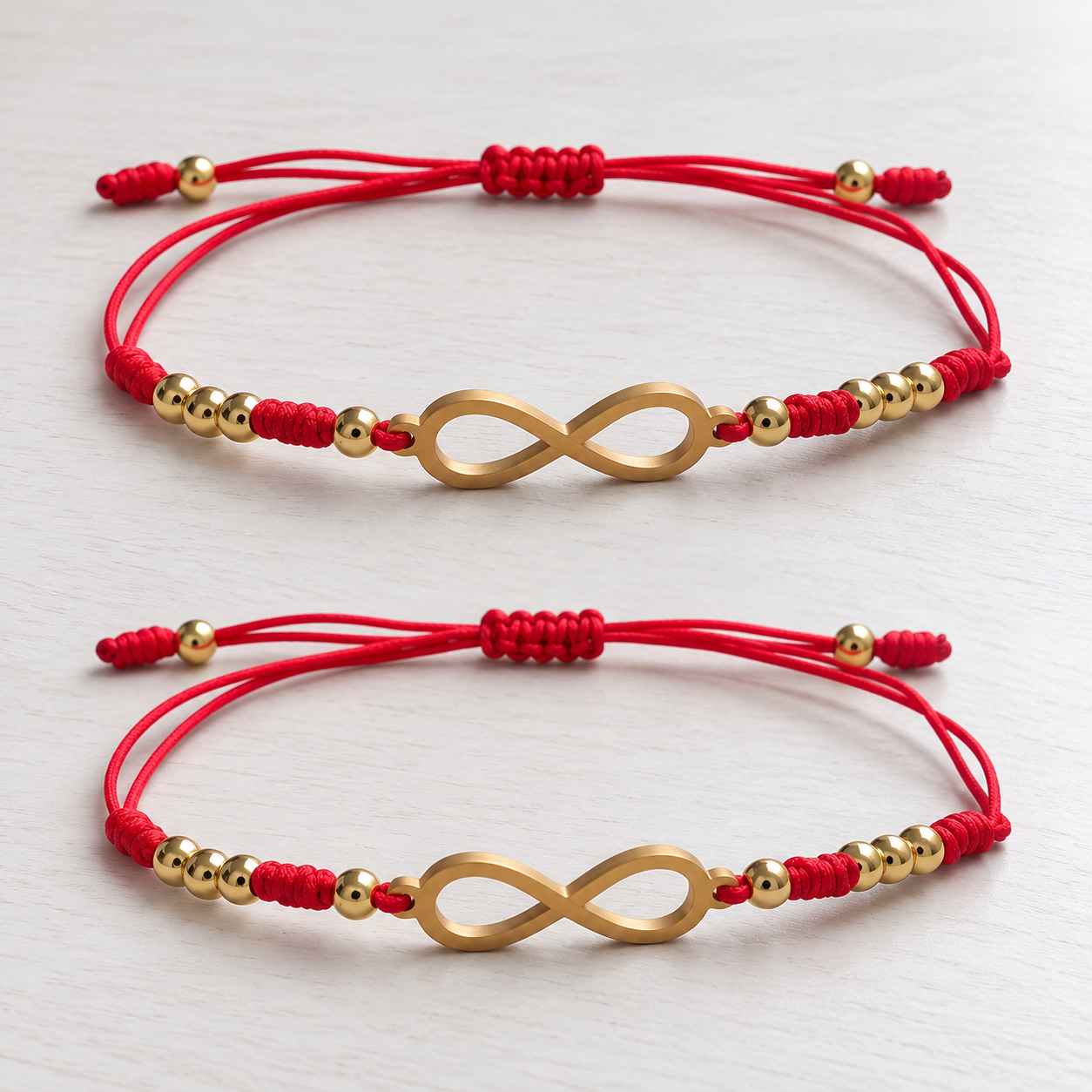 Combo x2 Manillas Infinito Carmesí Doradas para Pareja 1