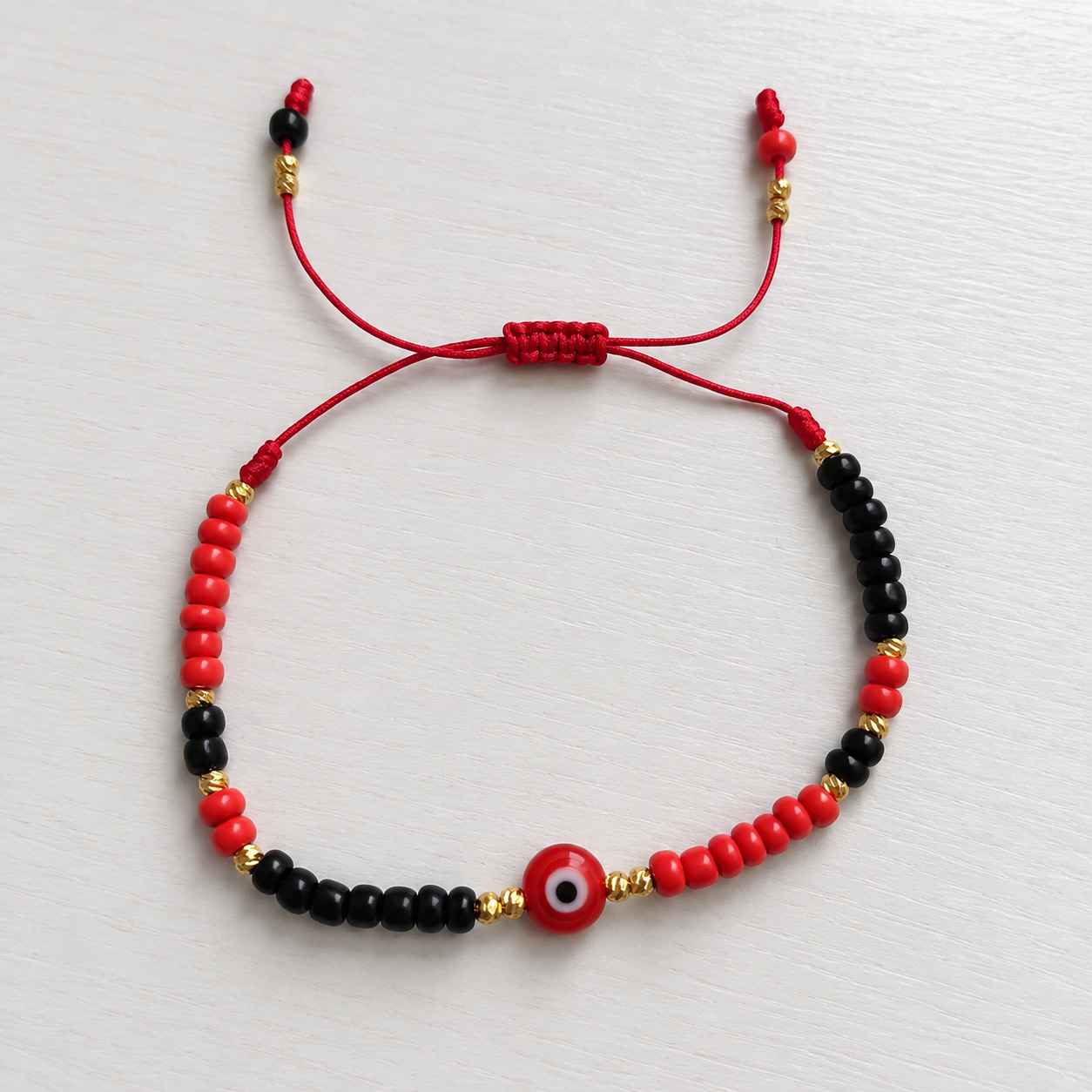 Manilla Ojo Turco Roja y Negra 1