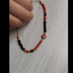 Manilla Ojo Turco Roja y Negra 5.1