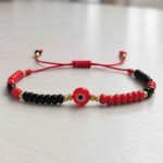 Manilla Ojo Turco Roja y Negra 8